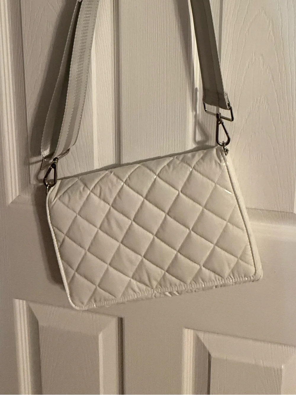 Quilted glossy White Crossbody Bag with Adjustable Strap. Never used
